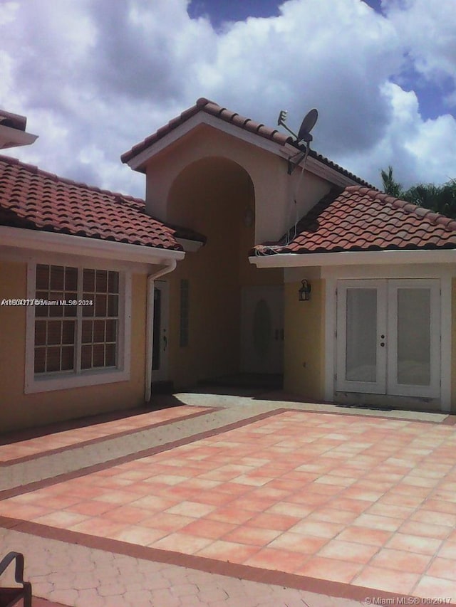 back of house featuring a patio area