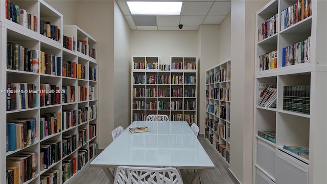 home office with a paneled ceiling