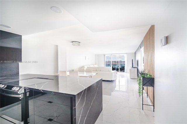 3800 S Ocean Dr Unit 803, Hollywood, FL 33019 - kitchen with open floor plan, marble finish floor, and modern cabinets