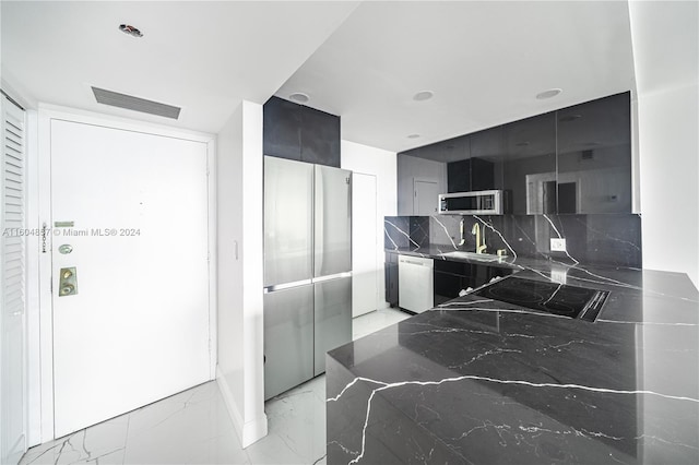 3800 S Ocean Dr Unit 803, Hollywood, FL 33019 - kitchen with visible vents, appliances with stainless steel finishes, marble finish floor, a sink, and dark cabinetry