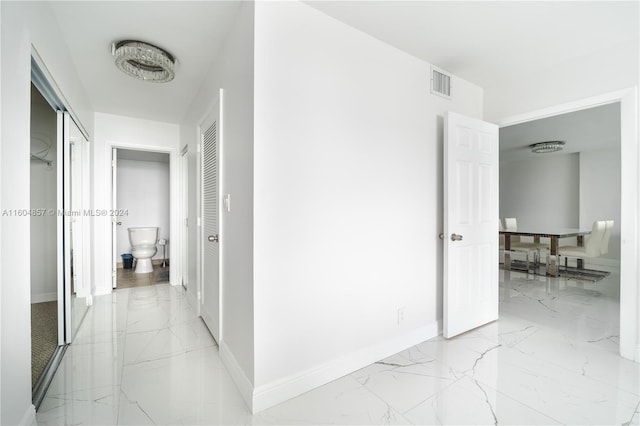 3800 S Ocean Dr Unit 803, Hollywood, FL 33019 - corridor with marble finish floor, baseboards, and visible vents