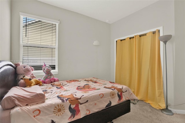 bedroom featuring carpet flooring