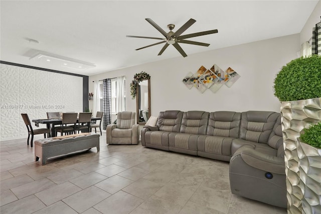 living room with light tile flooring and ceiling fan