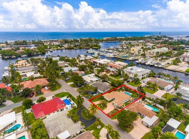 bird's eye view with a water view