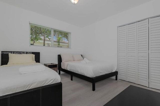 bedroom featuring light wood-type flooring