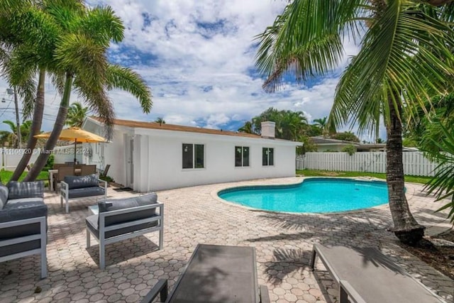 view of pool featuring a patio area and an outdoor hangout area