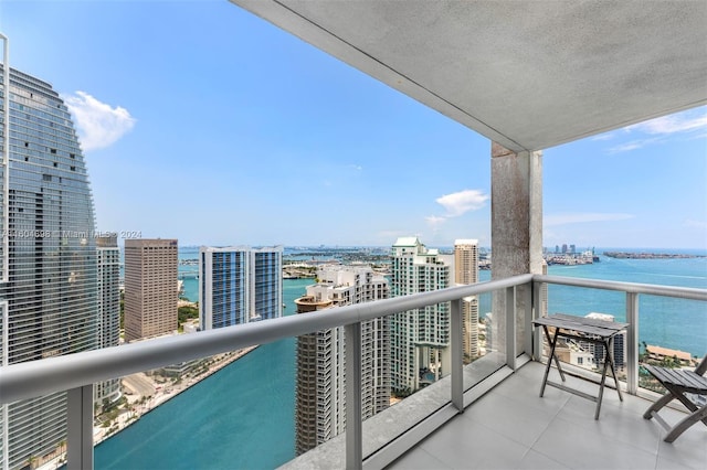 balcony featuring a water view