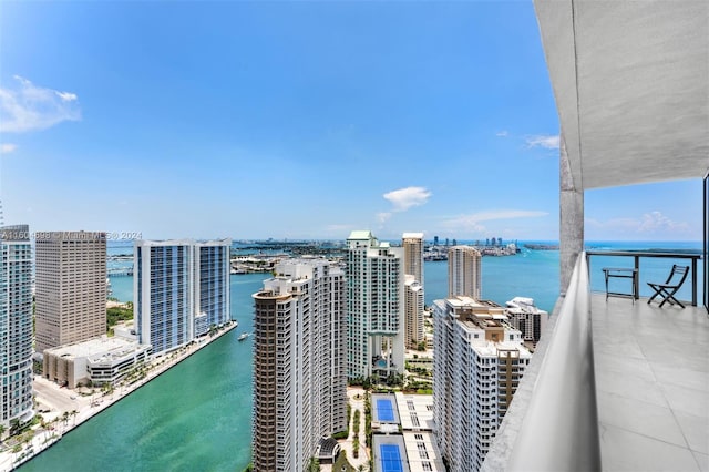 balcony featuring a water view