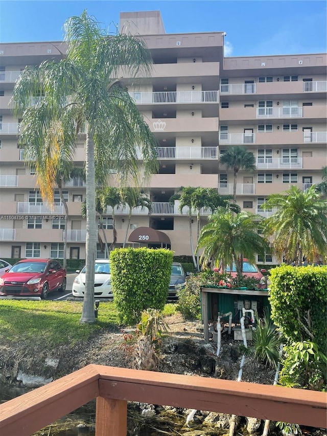 view of building exterior featuring a water view