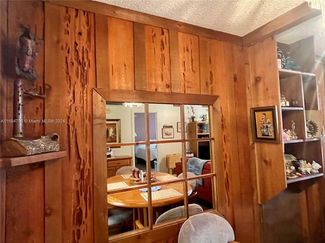 interior space with a textured ceiling