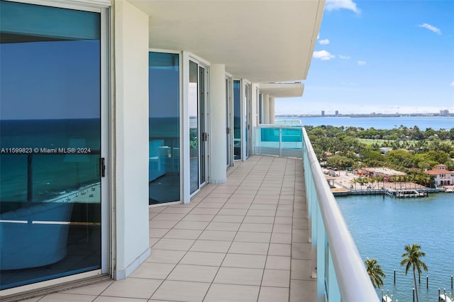 balcony featuring a water view