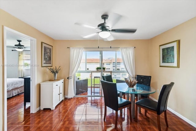 tiled dining area featuring ceiling fan