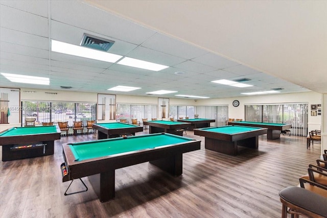 rec room featuring billiards, hardwood / wood-style flooring, and a drop ceiling