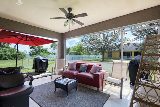 view of patio / terrace featuring an outdoor living space, a grill, and ceiling fan