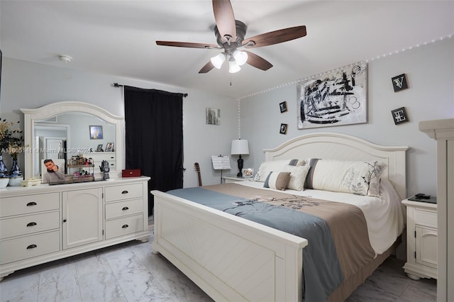 bedroom featuring ceiling fan