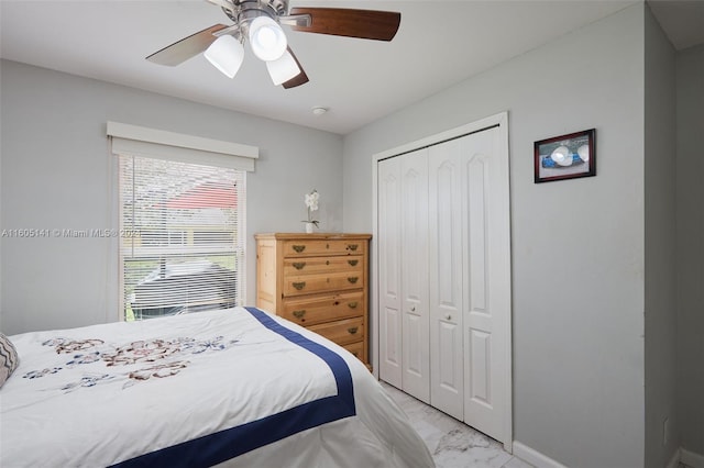 bedroom with a closet and ceiling fan