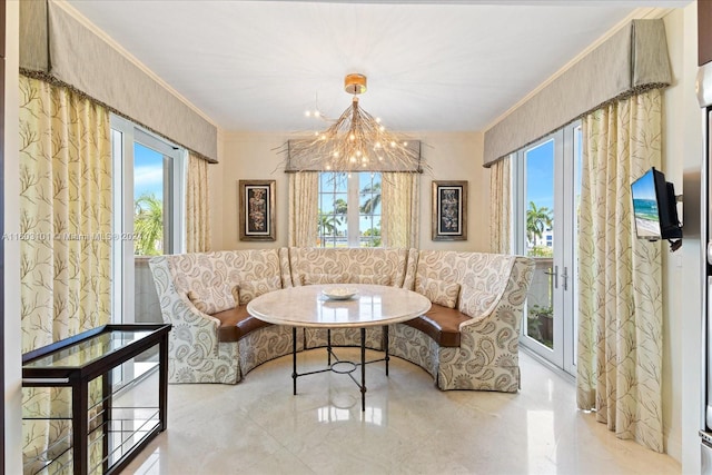 tiled dining area with ornamental molding and a chandelier