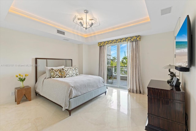 bedroom with access to outside, tile floors, a water view, a chandelier, and a raised ceiling