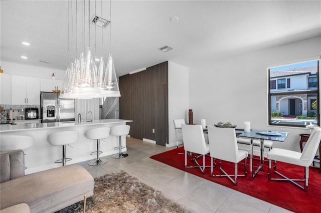 dining area with recessed lighting, visible vents, and light tile patterned flooring