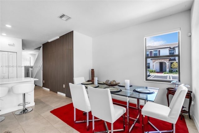 dining area featuring stairs, recessed lighting, visible vents, and light tile patterned floors