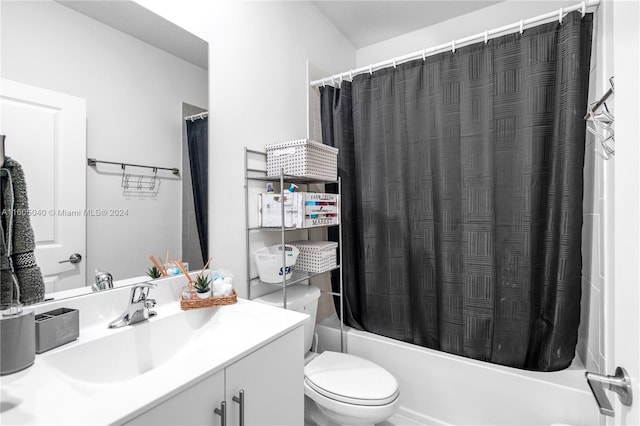 bathroom with shower / tub combo with curtain, vanity, and toilet