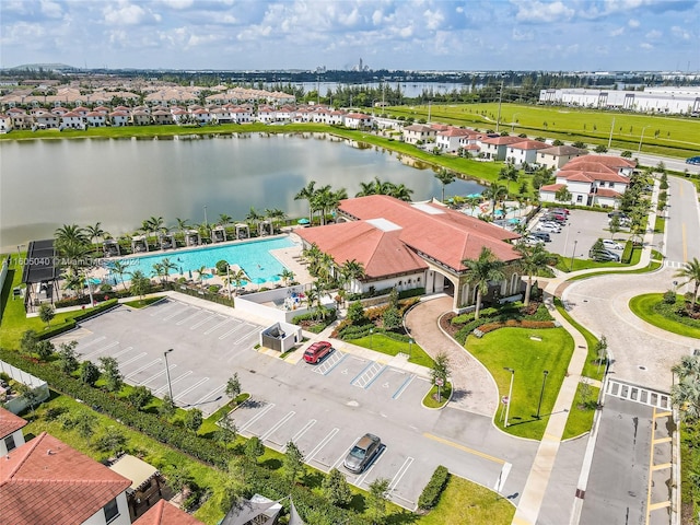 drone / aerial view with a water view