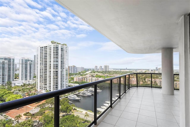 balcony featuring a water view