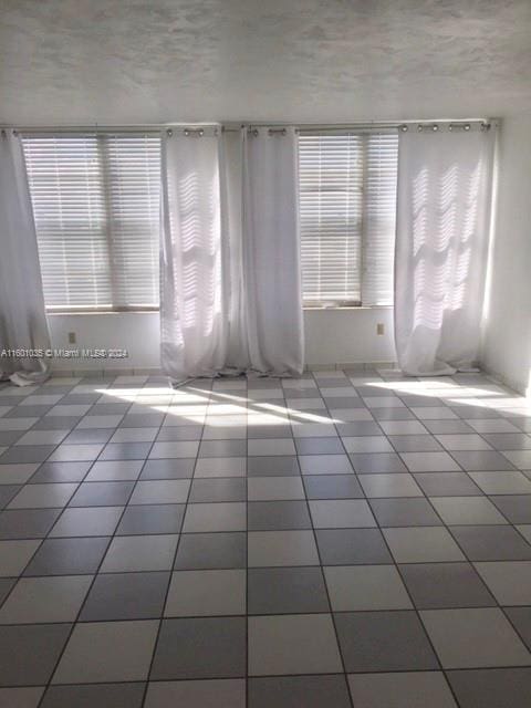 view of tiled empty room