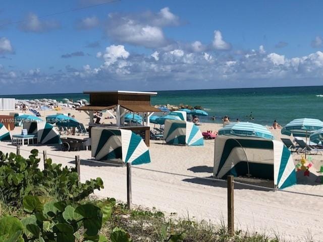 view of water feature with a beach view