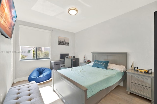 bedroom featuring light wood-type flooring