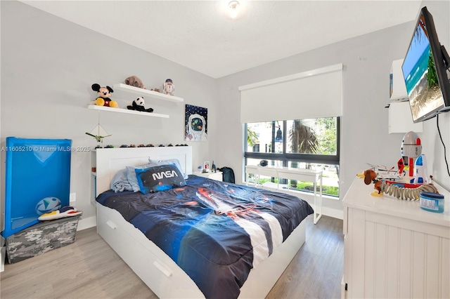 bedroom featuring light hardwood / wood-style flooring