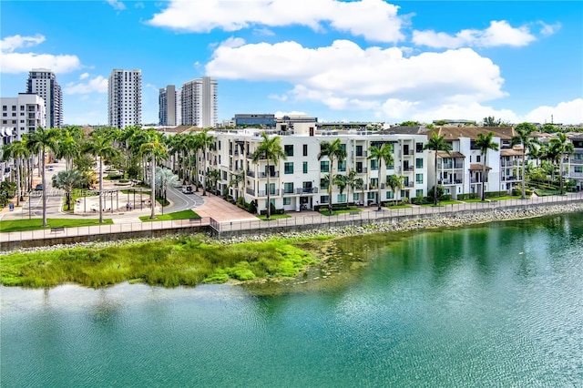 birds eye view of property with a water view