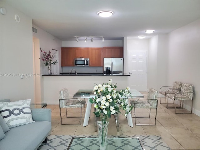 living room featuring light tile patterned flooring