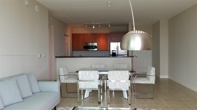 view of tiled dining area