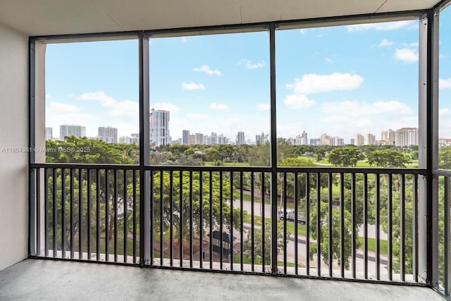 unfurnished sunroom with a view of city