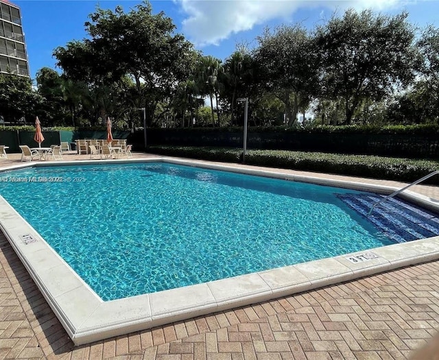 community pool featuring a patio