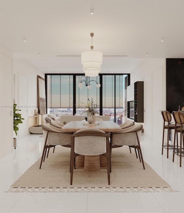 tiled dining room featuring expansive windows and an inviting chandelier