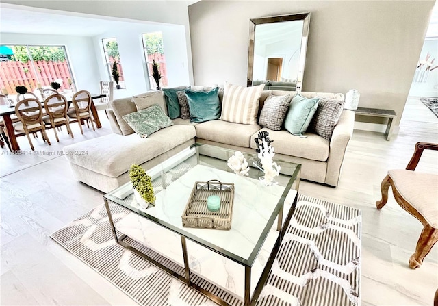 living room with light hardwood / wood-style floors