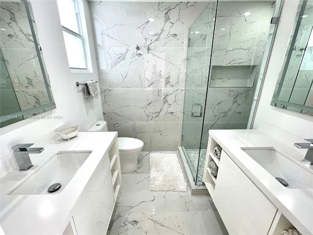 bathroom featuring tile walls, toilet, tile flooring, a shower with door, and vanity