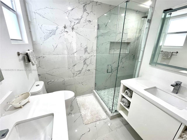 bathroom featuring tile flooring, an enclosed shower, tile walls, dual vanity, and toilet