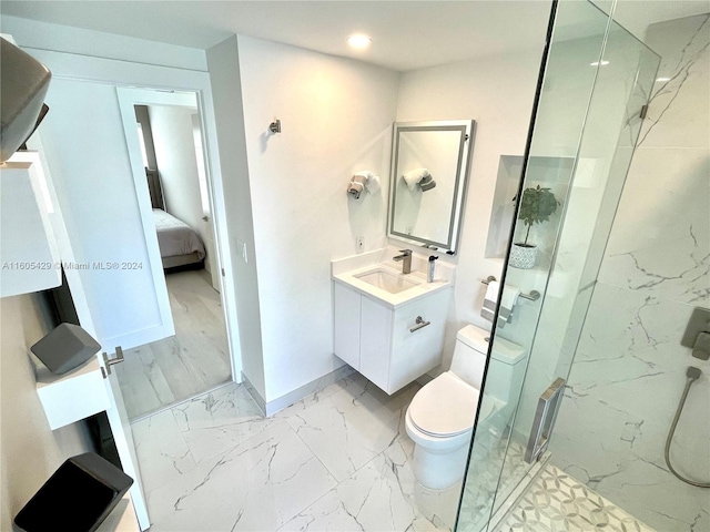 bathroom featuring tile flooring, an enclosed shower, oversized vanity, and toilet