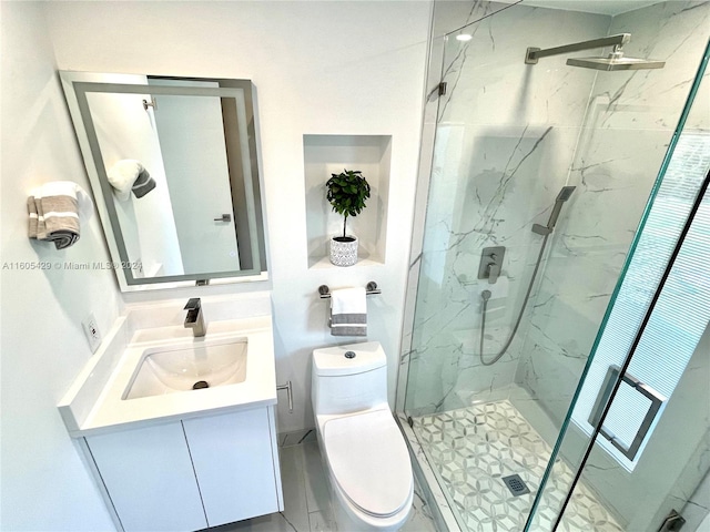 bathroom featuring ceiling fan, walk in shower, vanity, and toilet