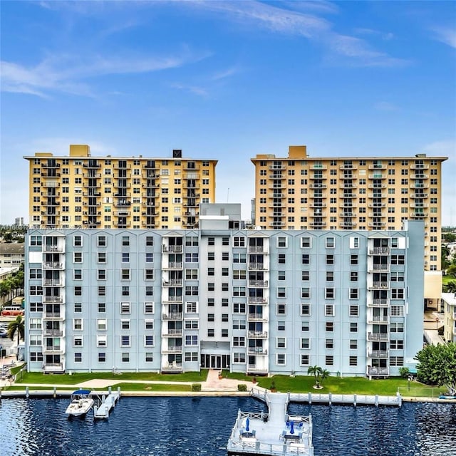 view of building exterior with a water view