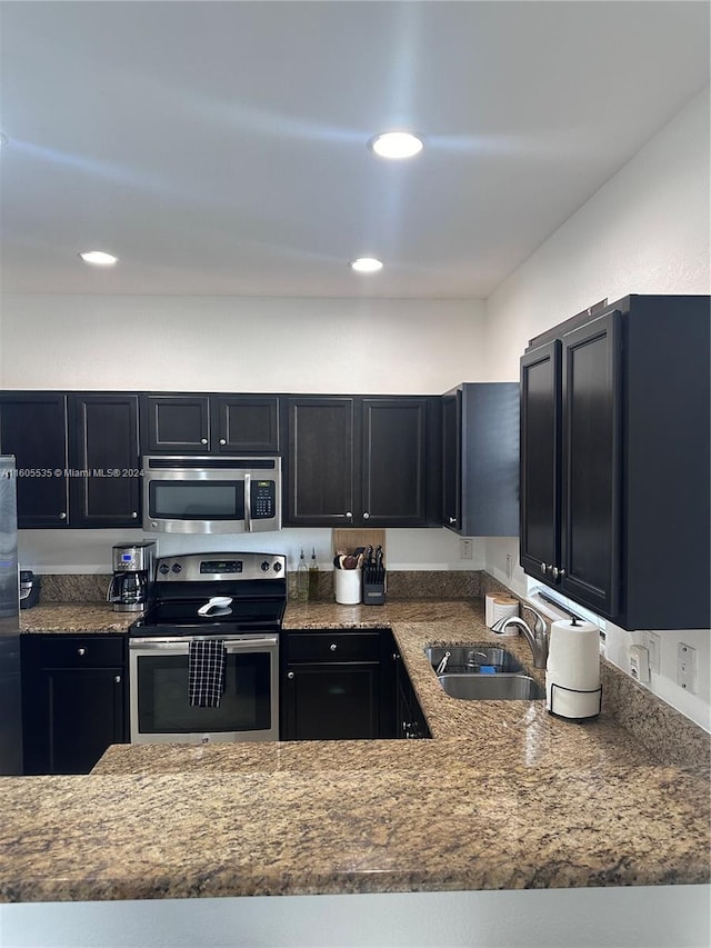 kitchen featuring sink and appliances with stainless steel finishes