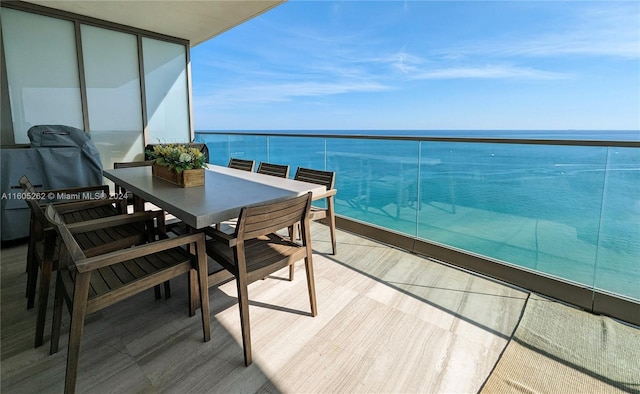 balcony featuring a water view