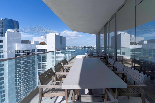 balcony featuring a water view