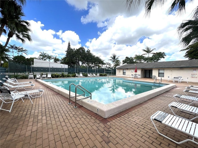 view of pool featuring a patio