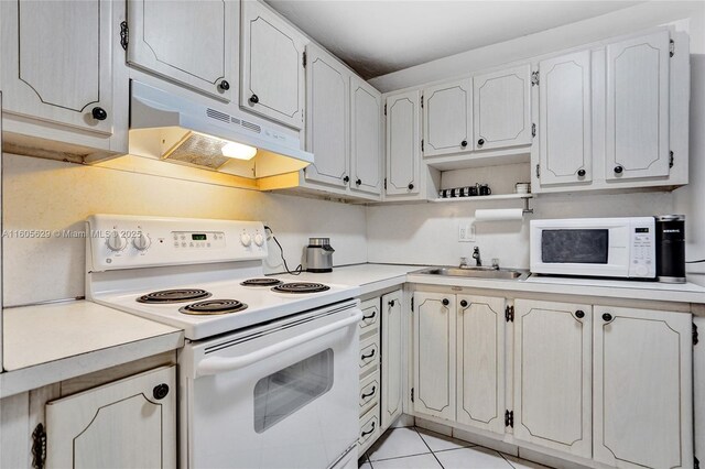 kitchen with sink, white cabinetry, and white range with electric stovetop