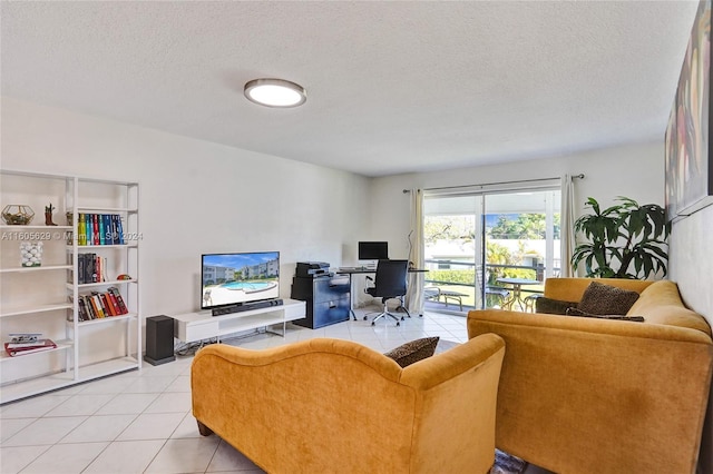 living room with a textured ceiling and light tile patterned floors