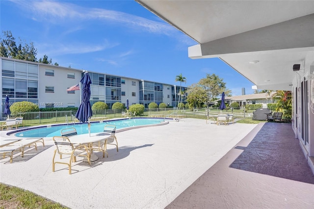 view of pool featuring a patio